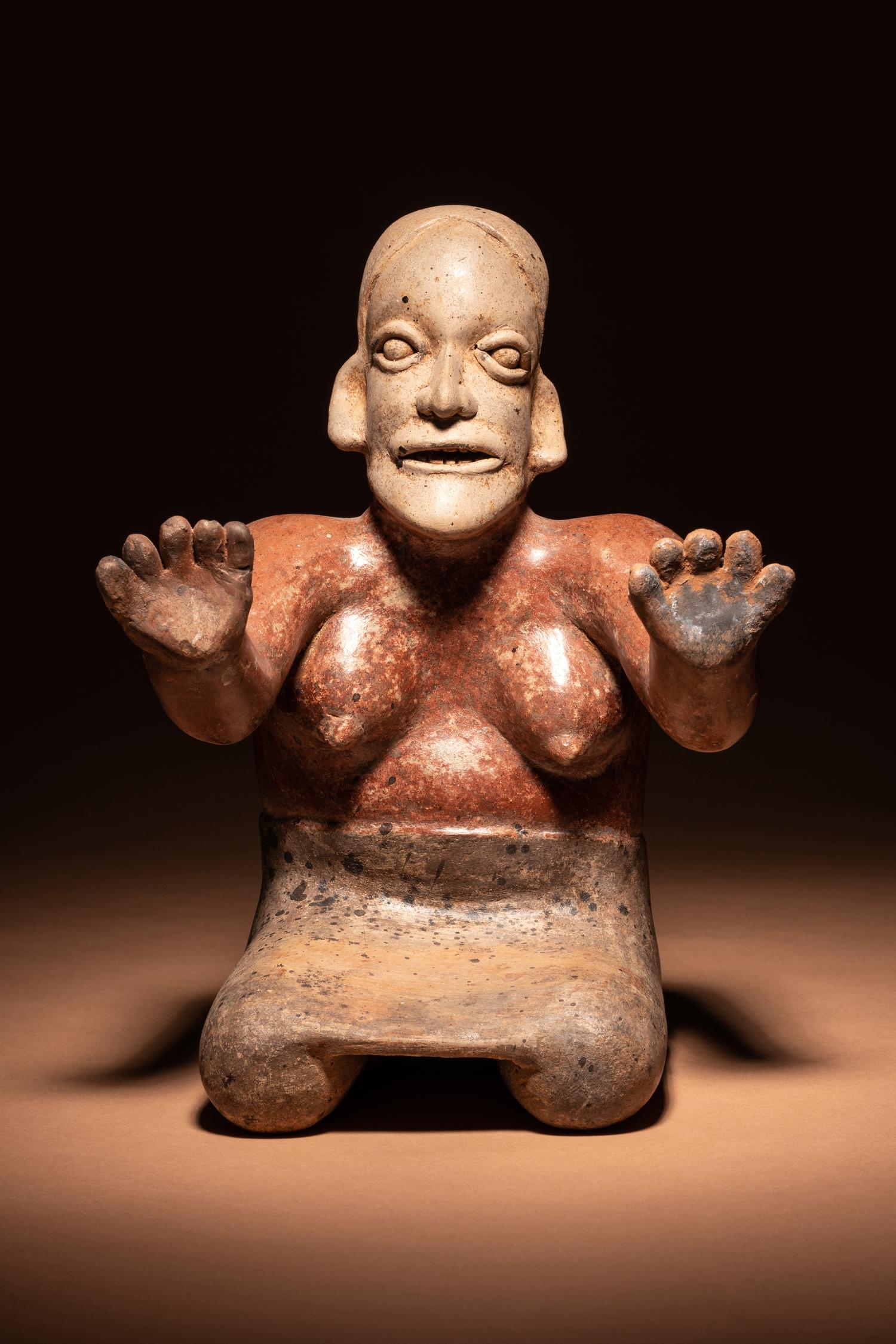 A Jalisco Terracotta Seated Female Figure