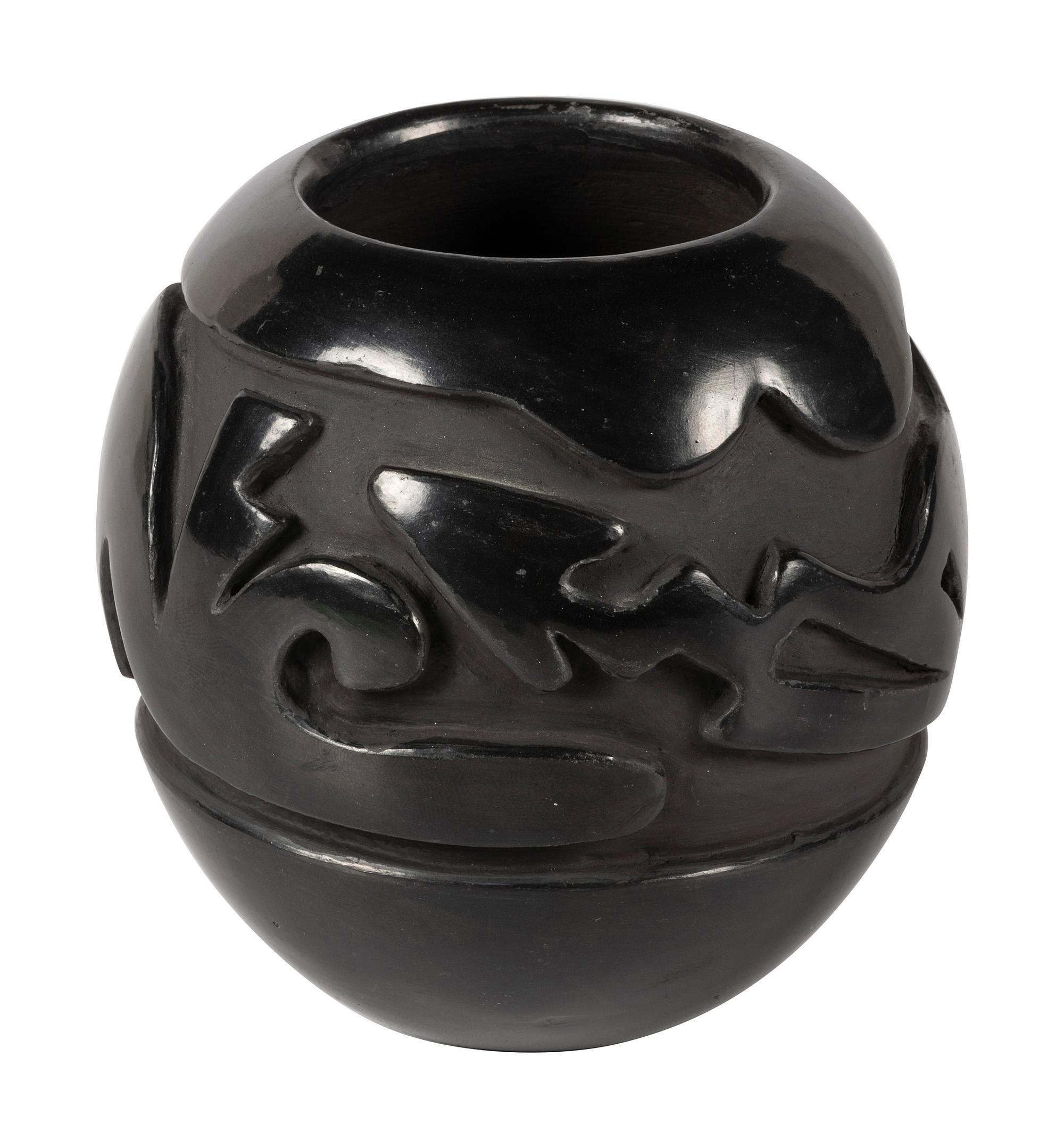 Deeply Carved Blackware Pottery Jar, with Avanyu