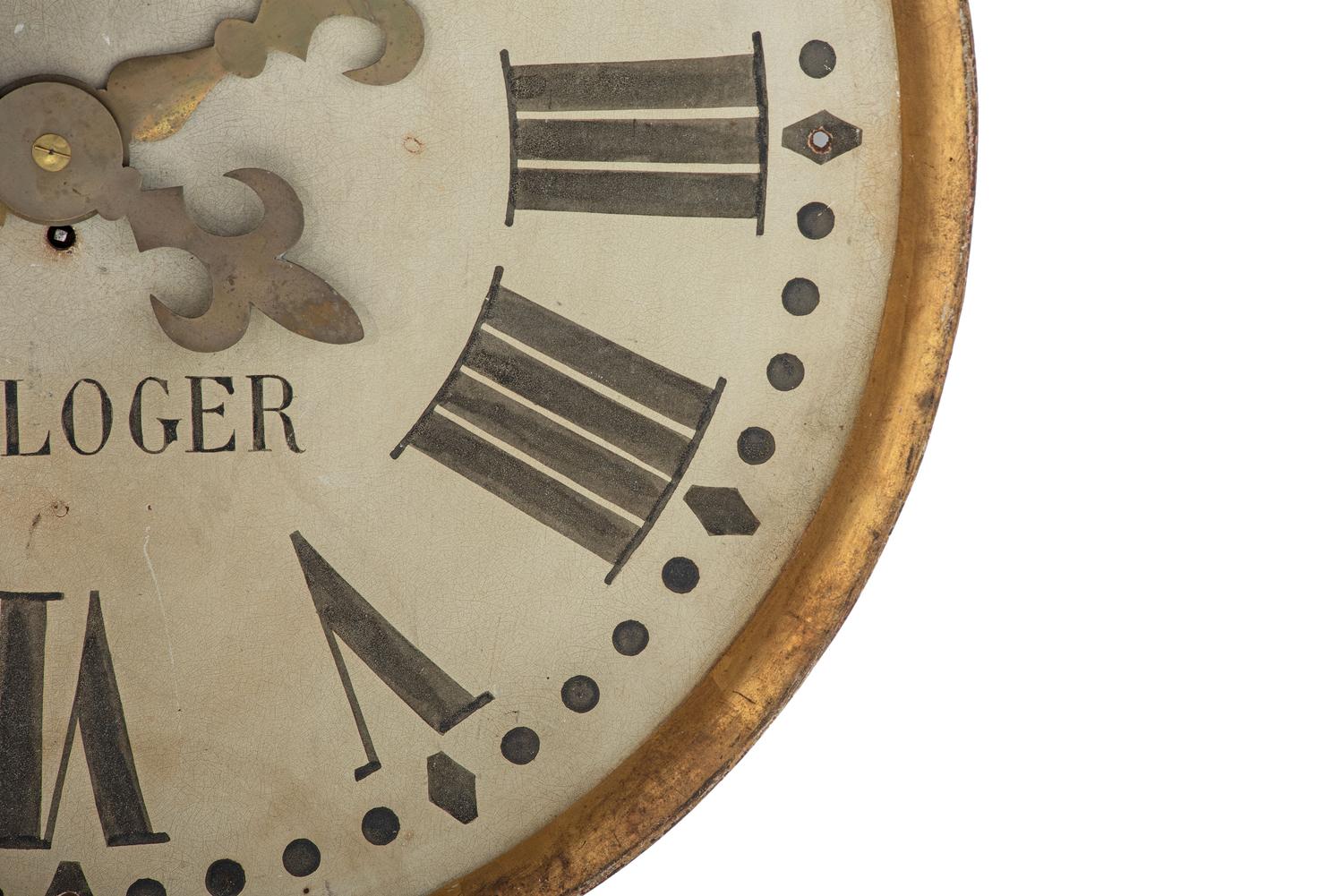 A French Painted and Parcel Gilt Tin Shop Wall Clock