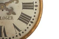A French Painted and Parcel Gilt Tin Shop Wall Clock