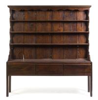 An Oak Welsh Dresser Height 75 1/2 x width 71 1/2 x depth 13 1/2 inches.