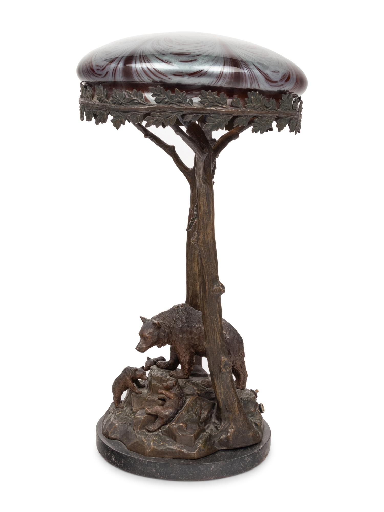 A Patinated Metal Figural Table Lamp