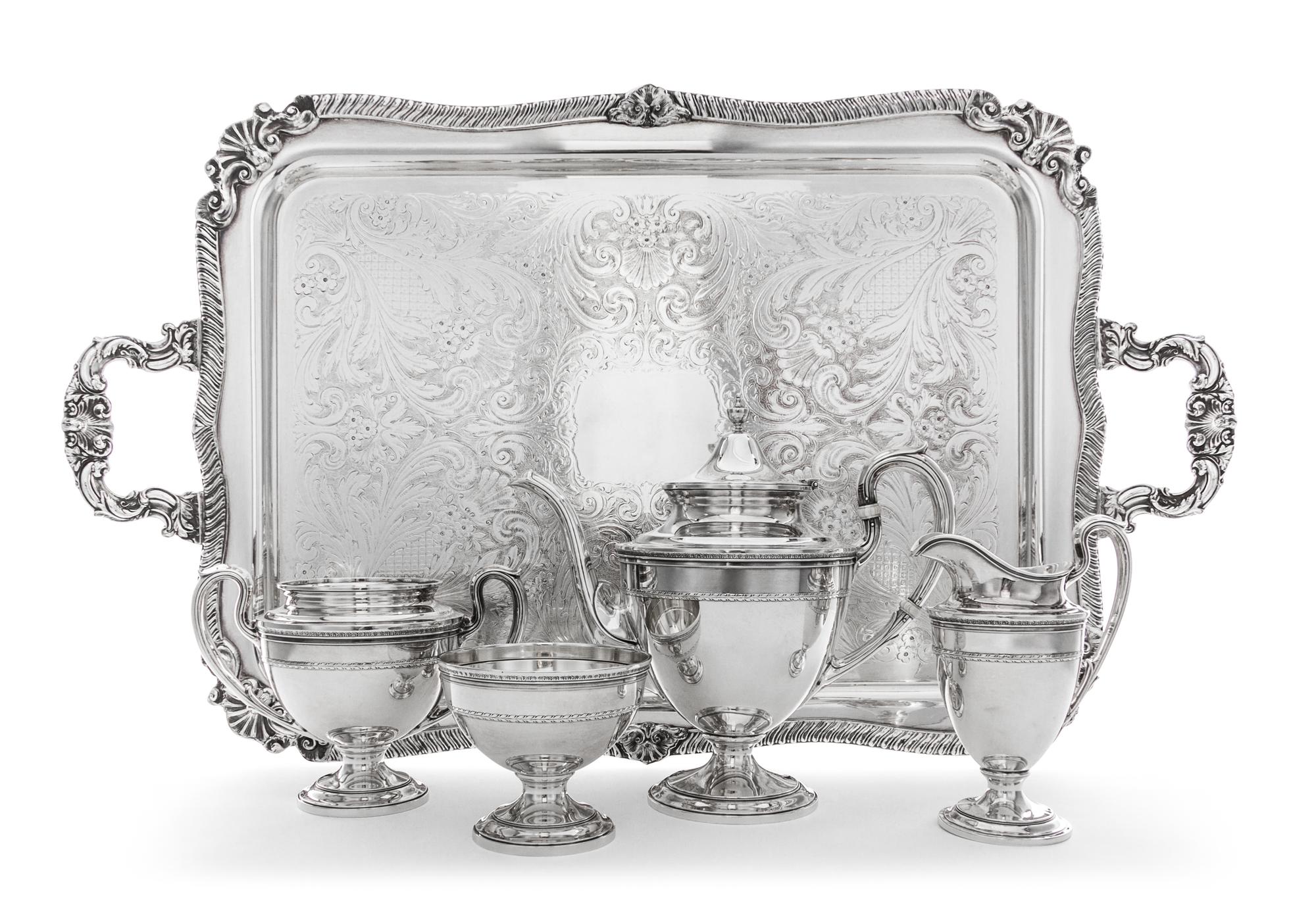 An American Silver Tea Service, Gorham Mfg. Co., Providence, RI, comprising a teapot, a creamer, a sugar and a waste bowl; together wit