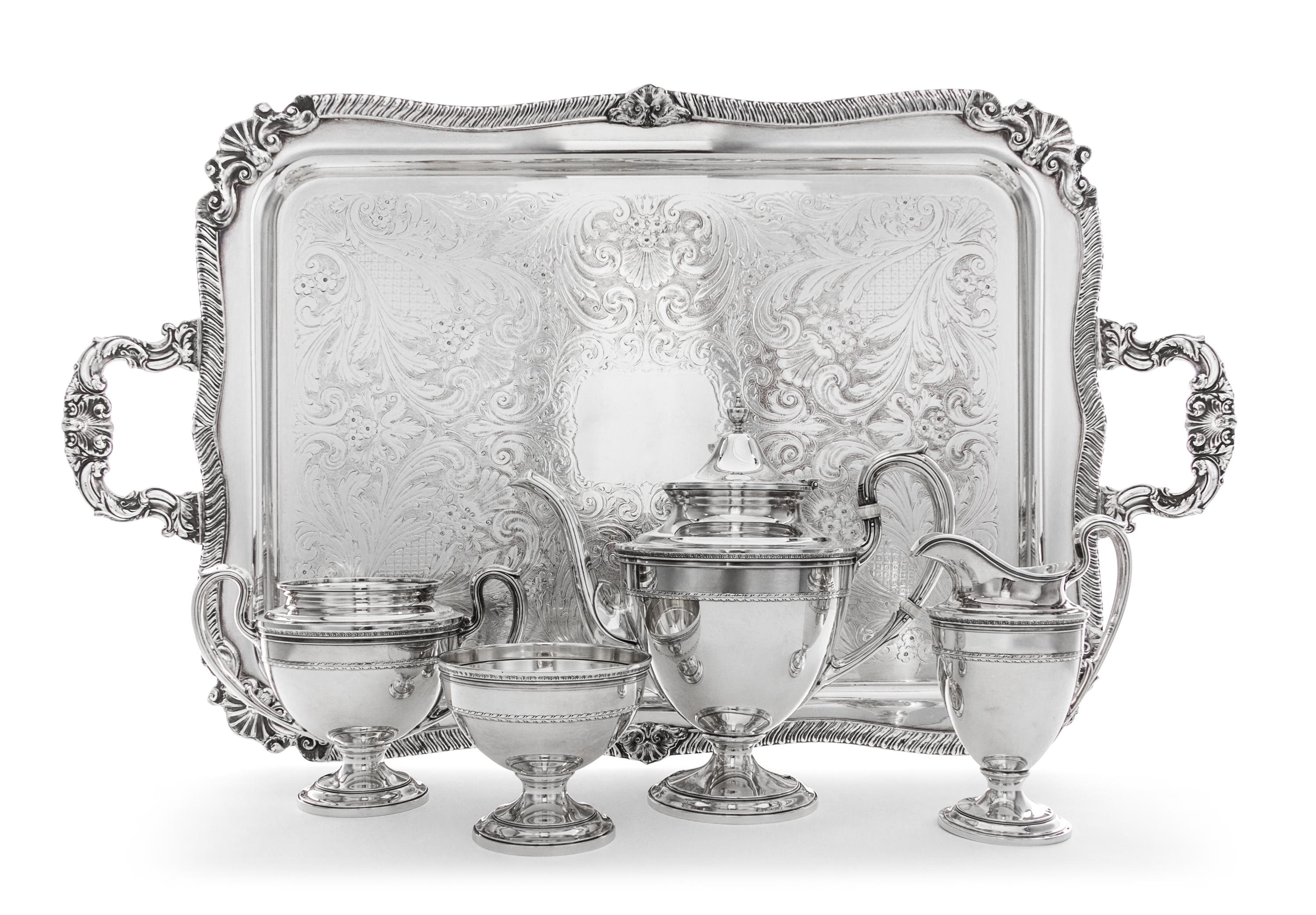 An American Silver Tea Service, Gorham Mfg. Co., Providence, RI, comprising a teapot, a creamer, a sugar and a waste bowl; together wit