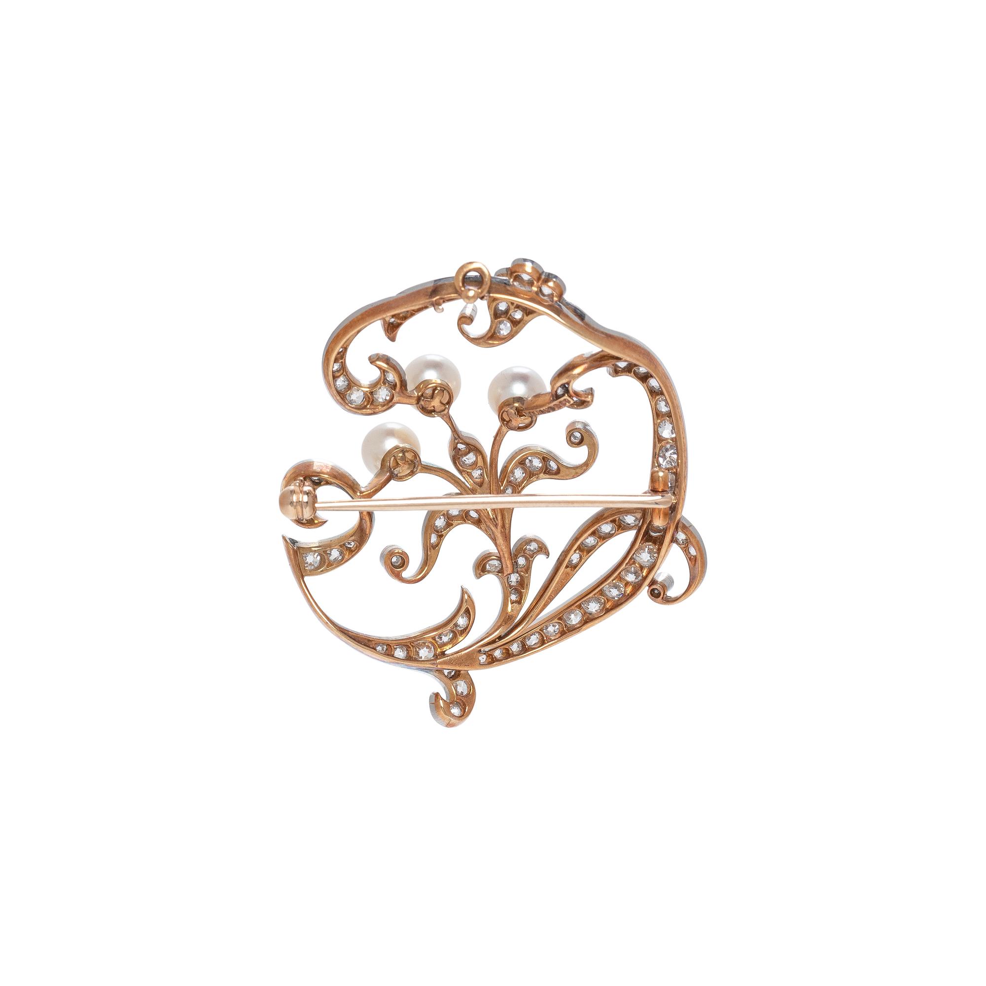 MARCUS & CO., EDWARDIAN, DIAMOND AND PEARL BROOCH