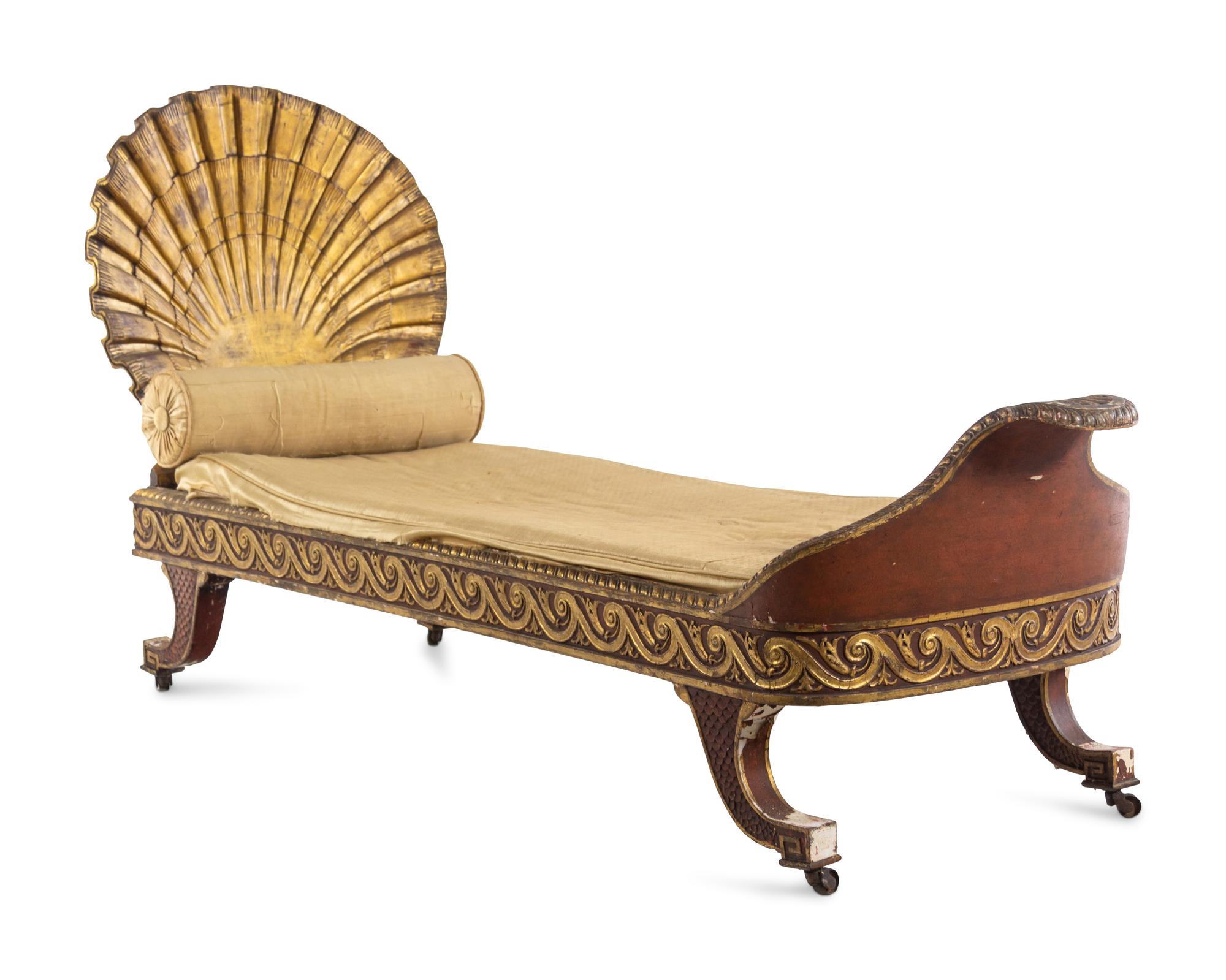 An Italian Walnut and Carved Giltwood Daybed