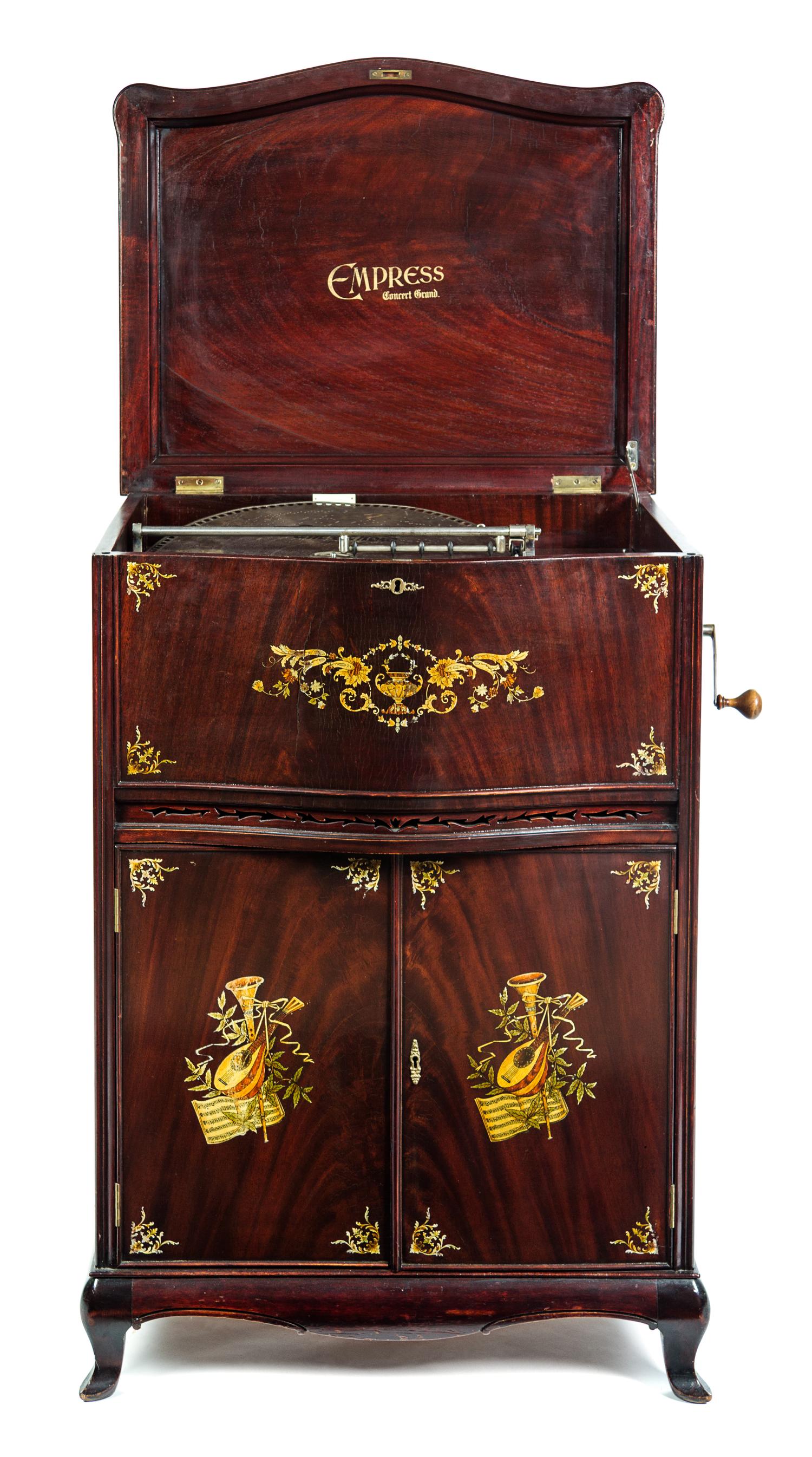 An Empress Concert Grand Music Box Height 41 1/4 inches. — EARLY 20TH CENTURY