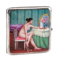 An Enameled Silver Cigarette Case, Late 19th/Early 20th Century, the lid enameled to show a seated nude before a dressing table.