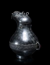 A Chinese Archaistic Bronze Animal-Form Wine Vessel
