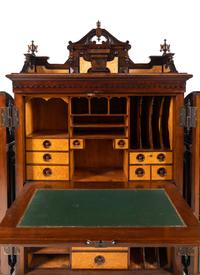 A Victorian Walnut and Bird’s Eye Maple Wooten Patent Desk
