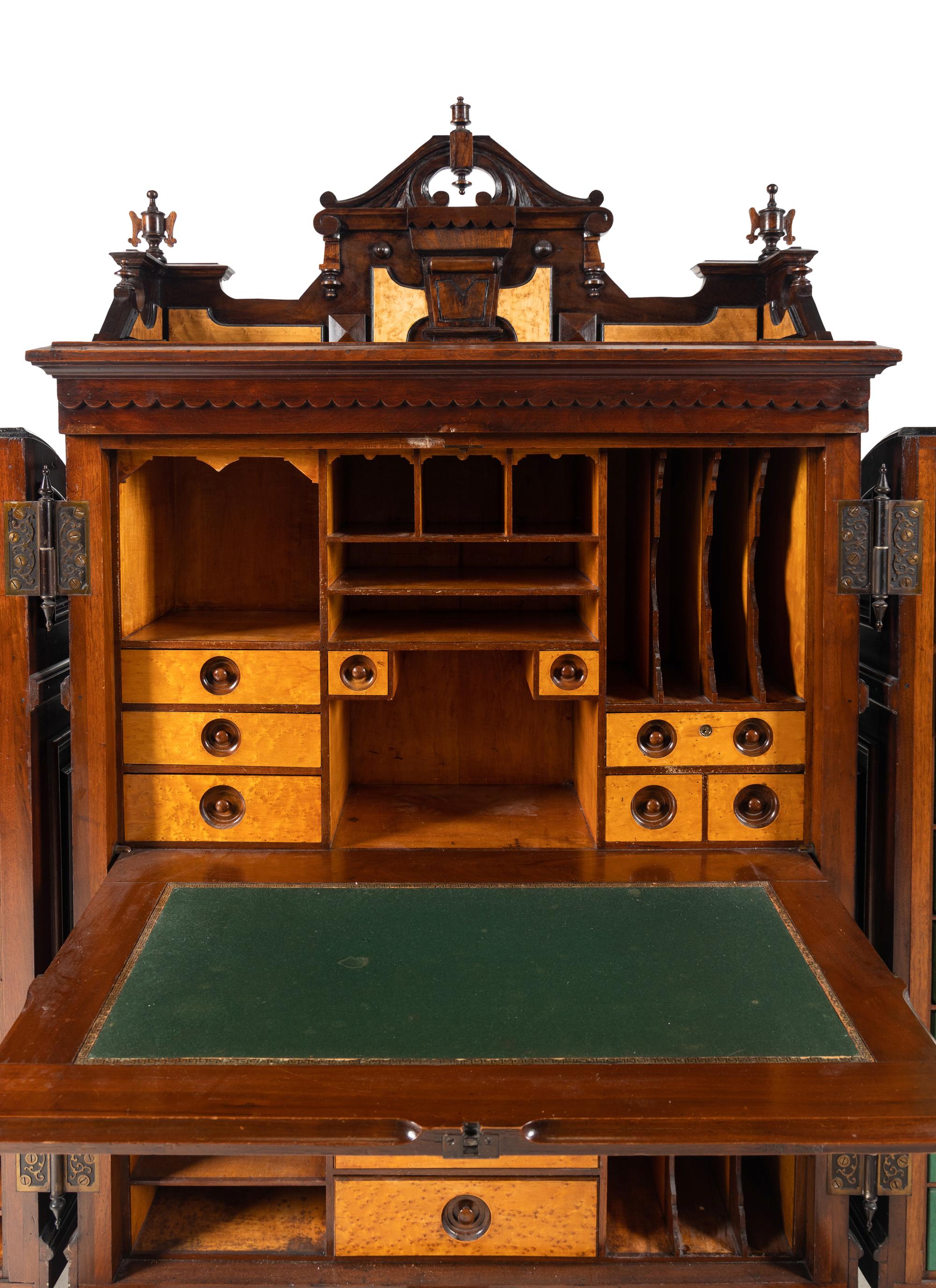 A Victorian Walnut and Bird’s Eye Maple Wooten Patent Desk