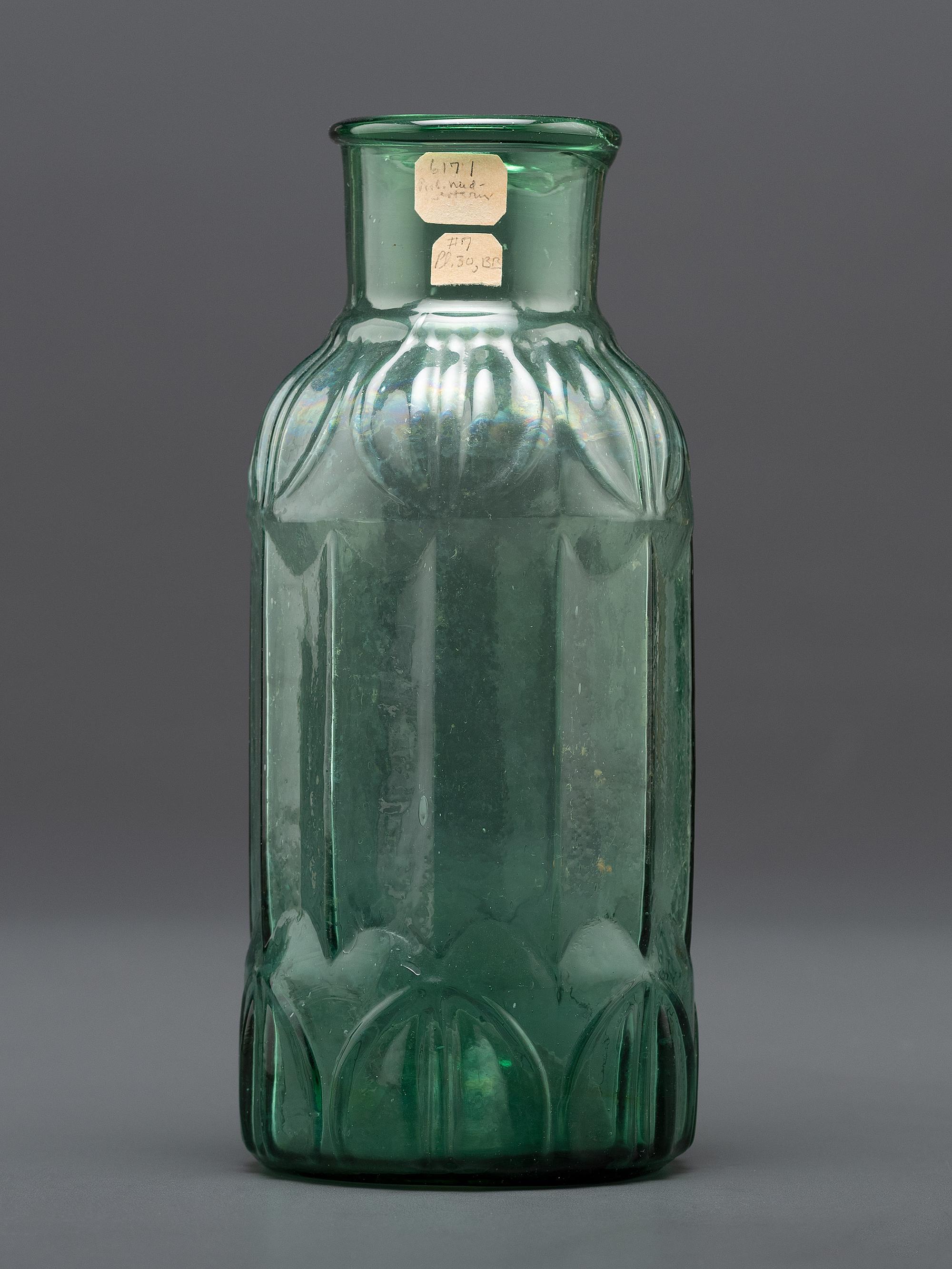 An Early Midwestern Glass Bottle in Green