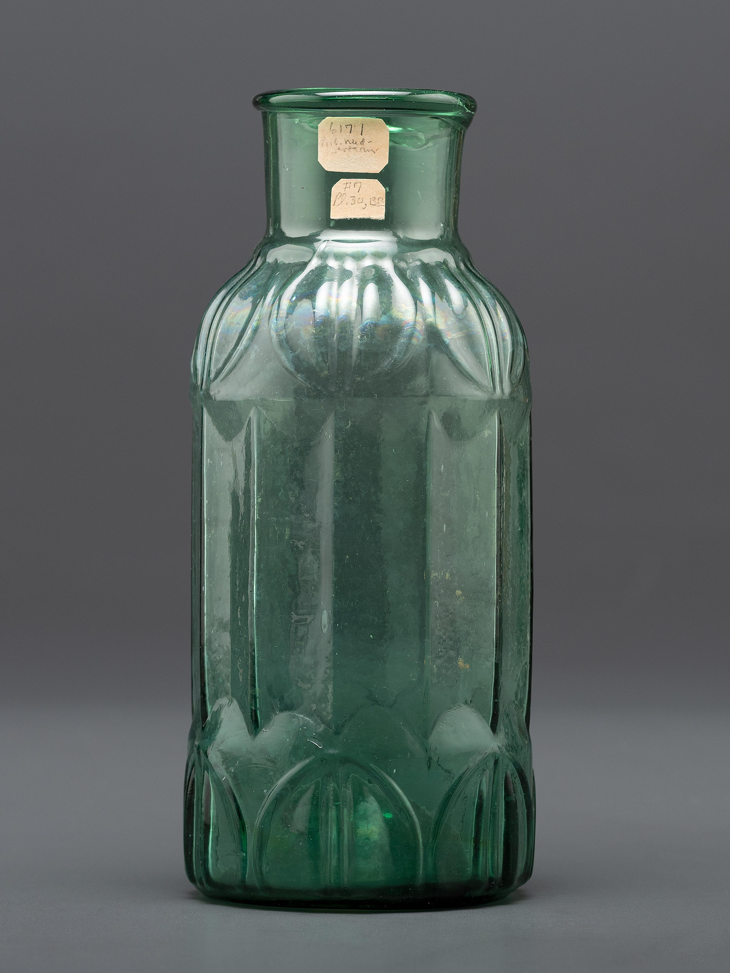 An Early Midwestern Glass Bottle in Green