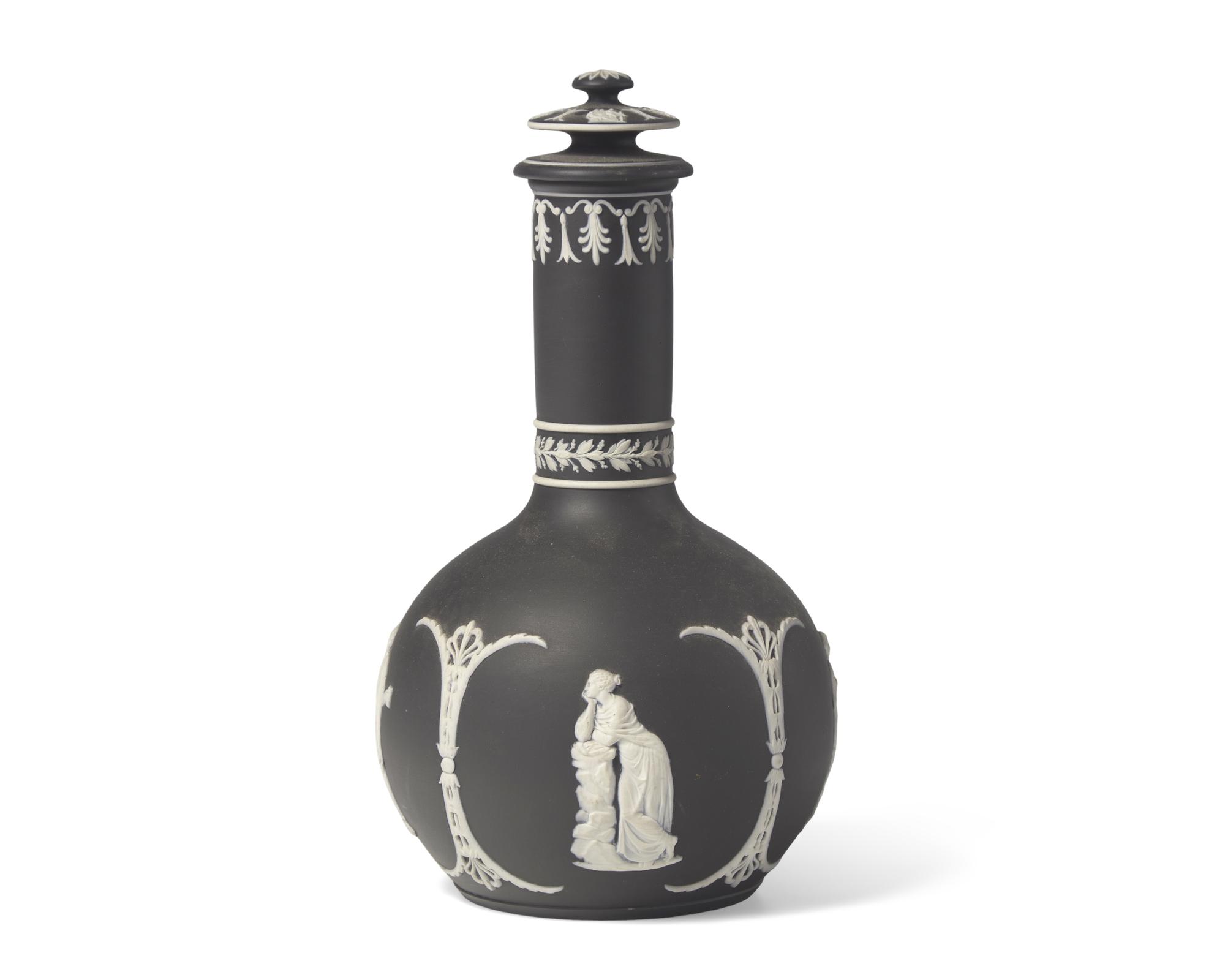 A Wedgwood Black Jasperware Bottle Vase and Cover