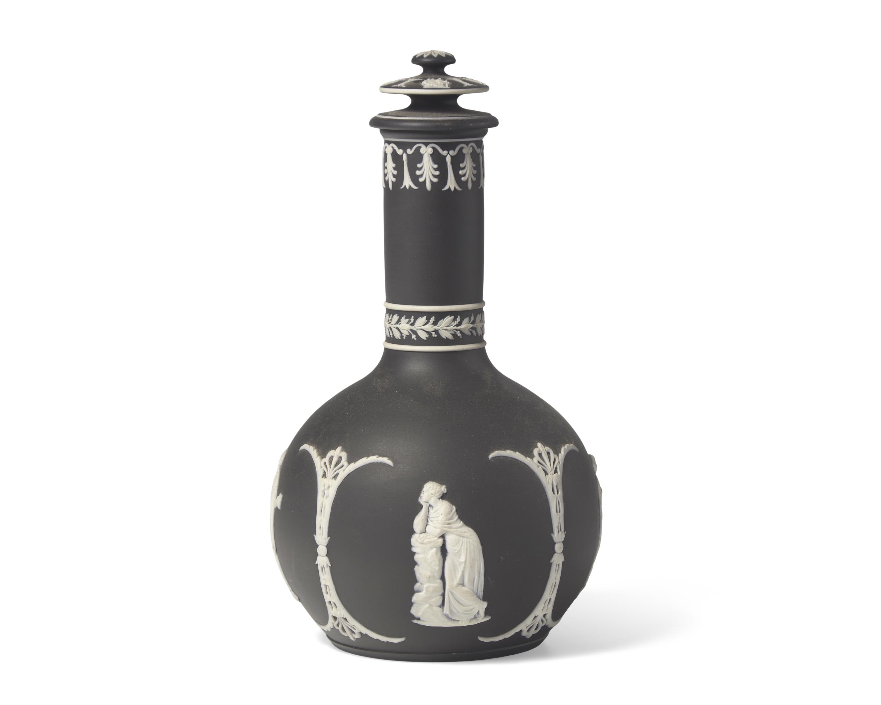 A Wedgwood Black Jasperware Bottle Vase and Cover