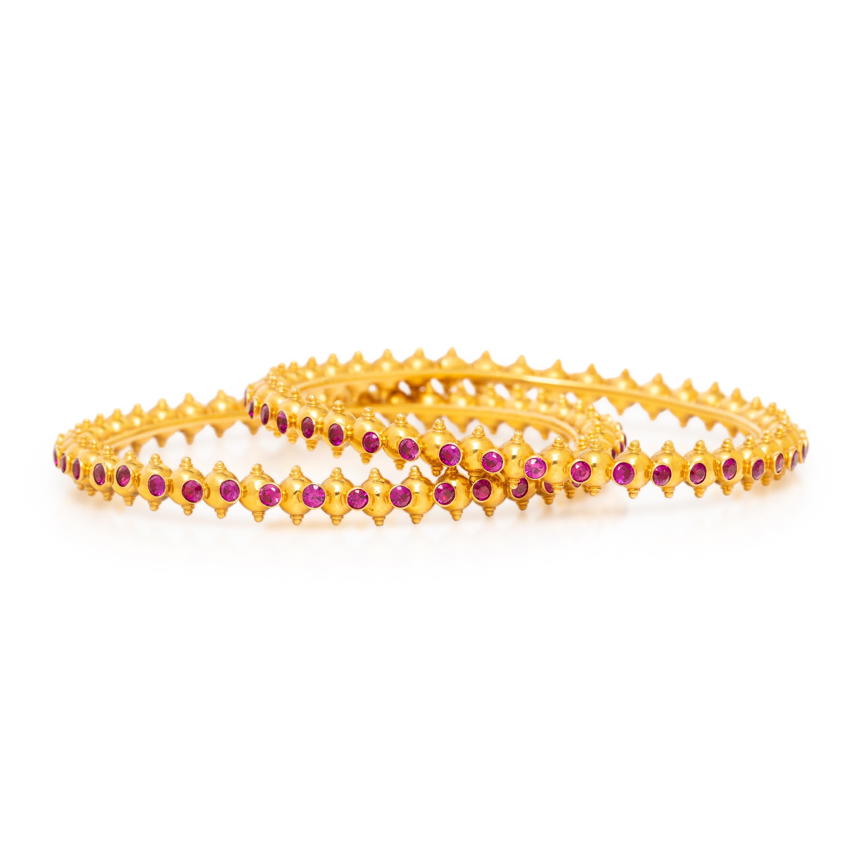 Pair of High-Karat Yellow Gold and Synthetic Ruby Bangle Bracelets