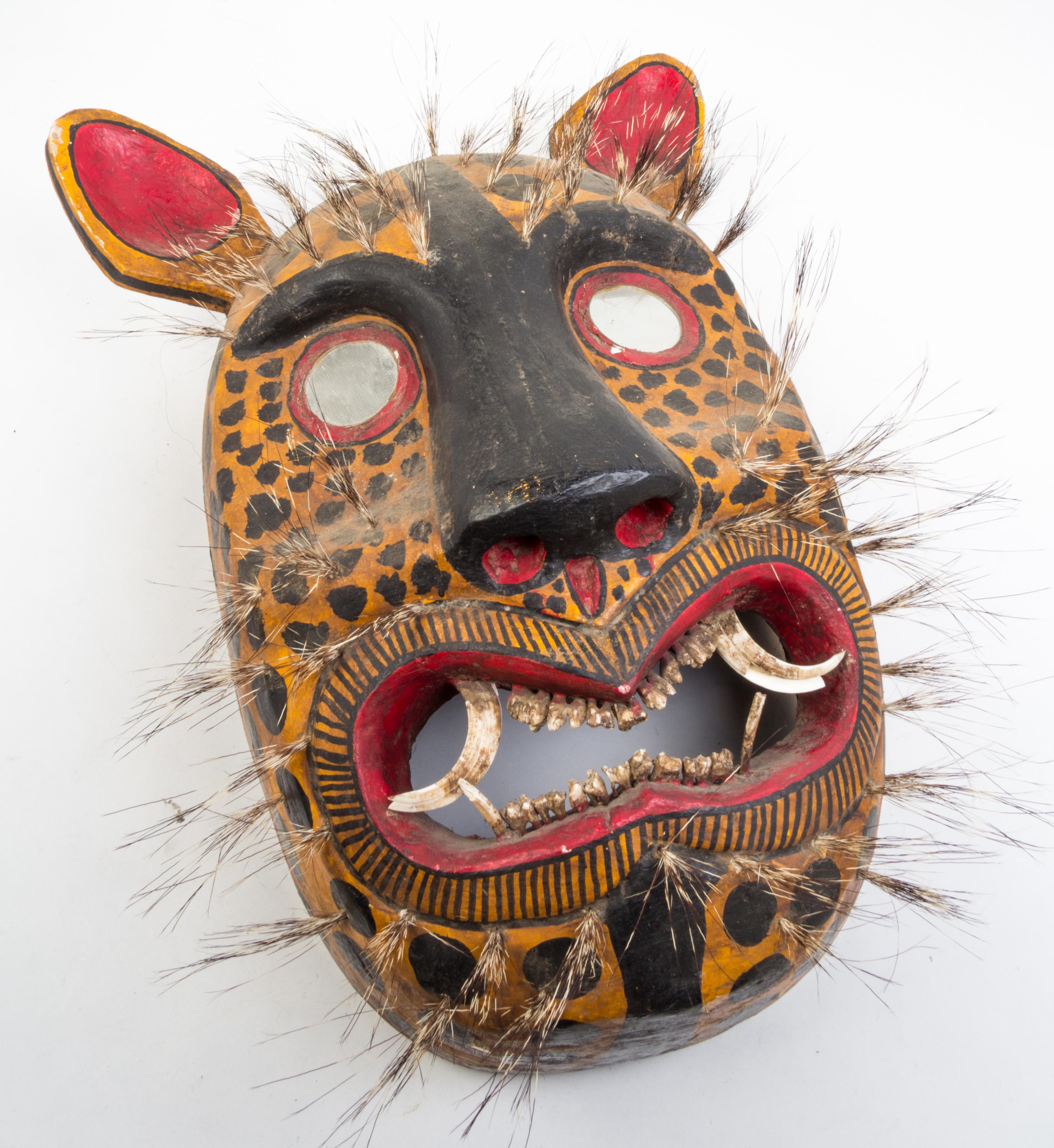 Two Mexican Painted Masks Height of taller 32 inches.