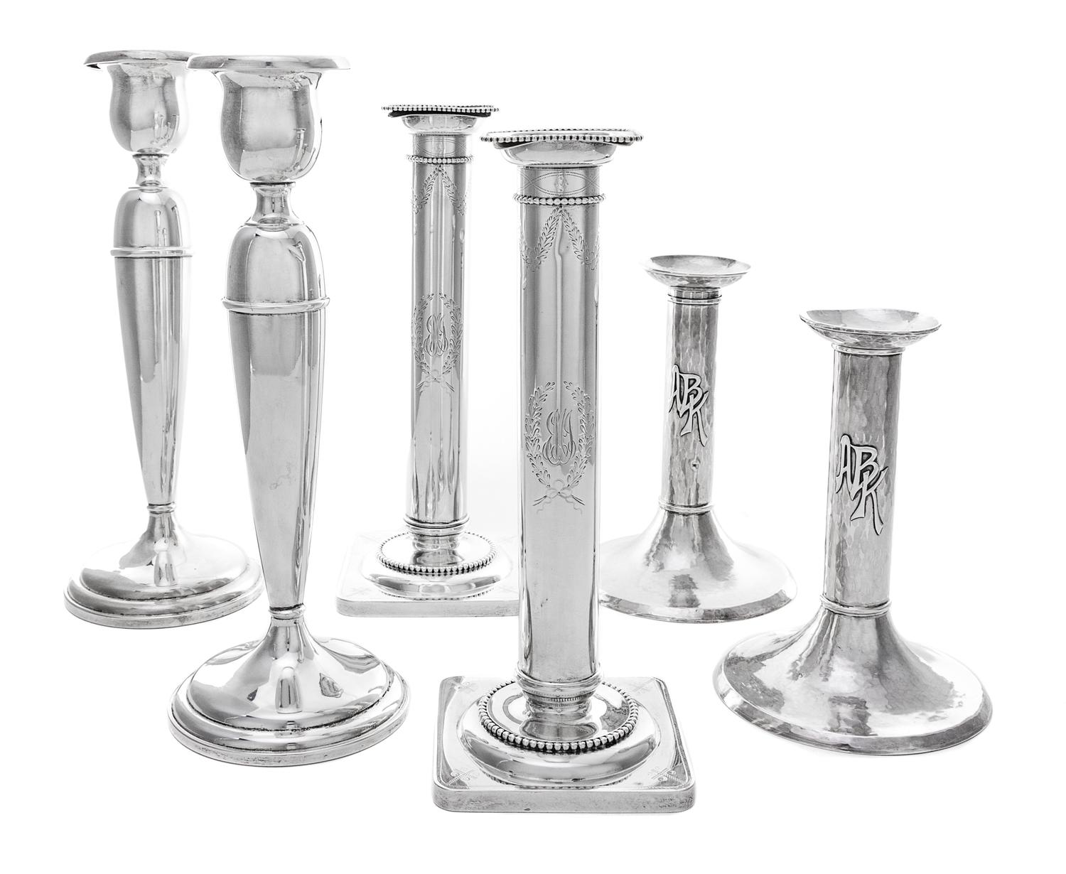 Three Pairs of American Silver Candlesticks Height of first pair 10 1/4 inches.