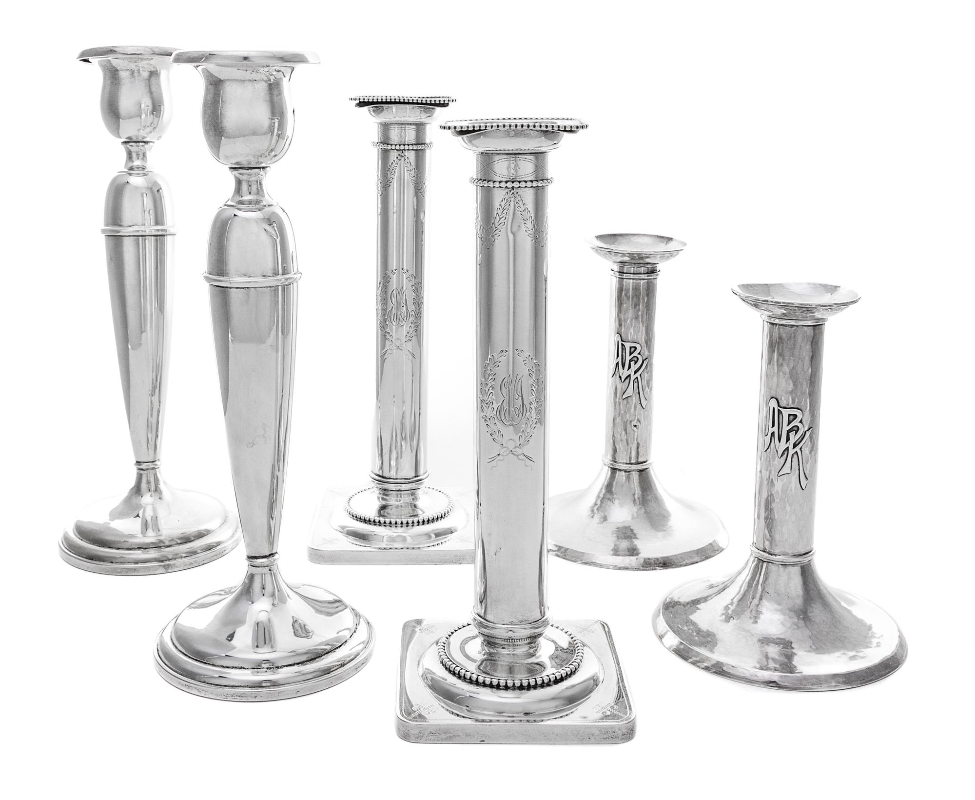 Three Pairs of American Silver Candlesticks Height of first pair 10 1/4 inches.
