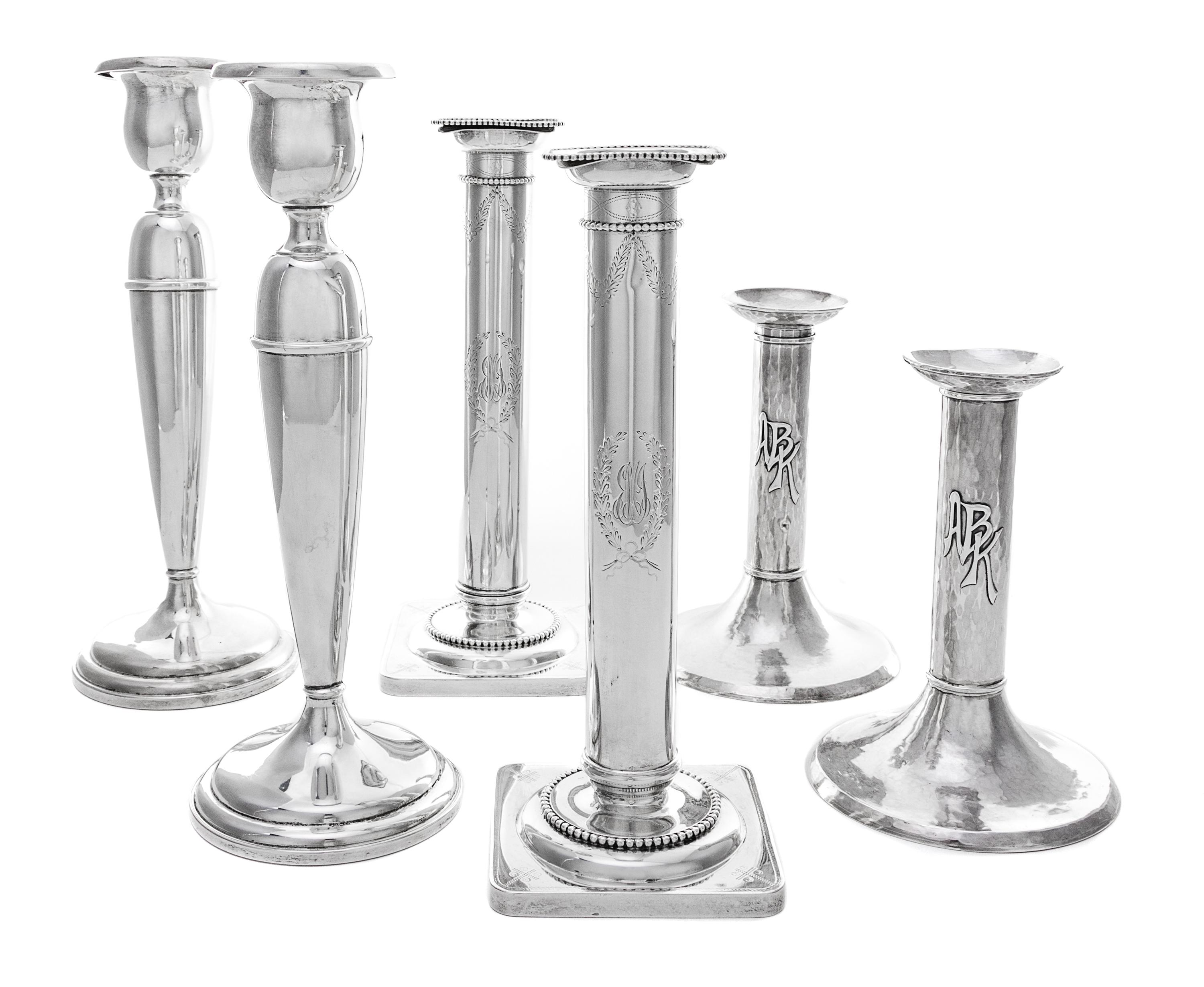 Three Pairs of American Silver Candlesticks Height of first pair 10 1/4 inches.