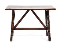 A Spanish Baroque Style Walnut Trestle Table Height 31 1/2 x width 45 1/2 x depth 22 1/2 inches. — 18TH CENTURY