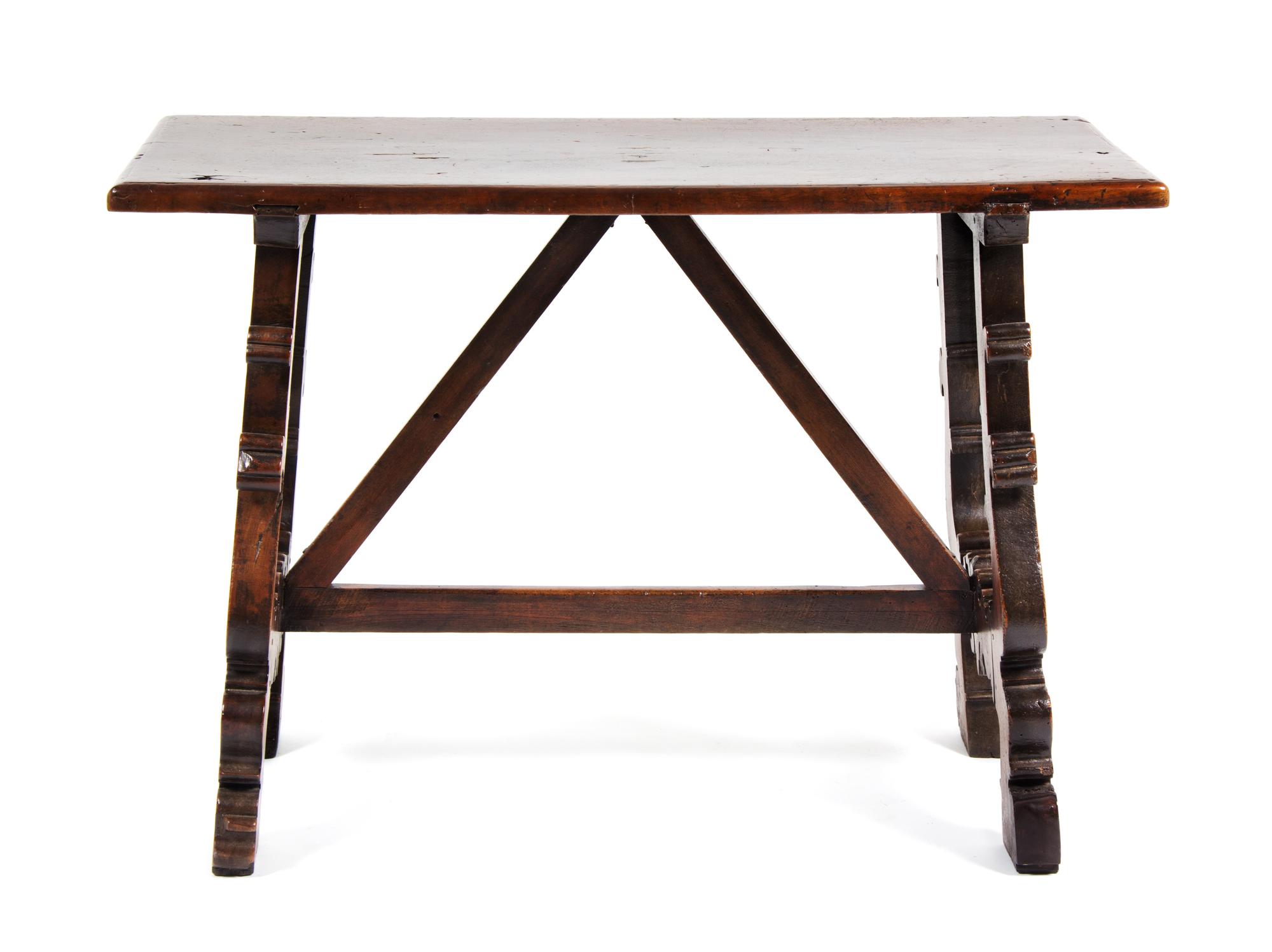 A Spanish Baroque Style Walnut Trestle Table Height 31 1/2 x width 45 1/2 x depth 22 1/2 inches. — 18TH CENTURY