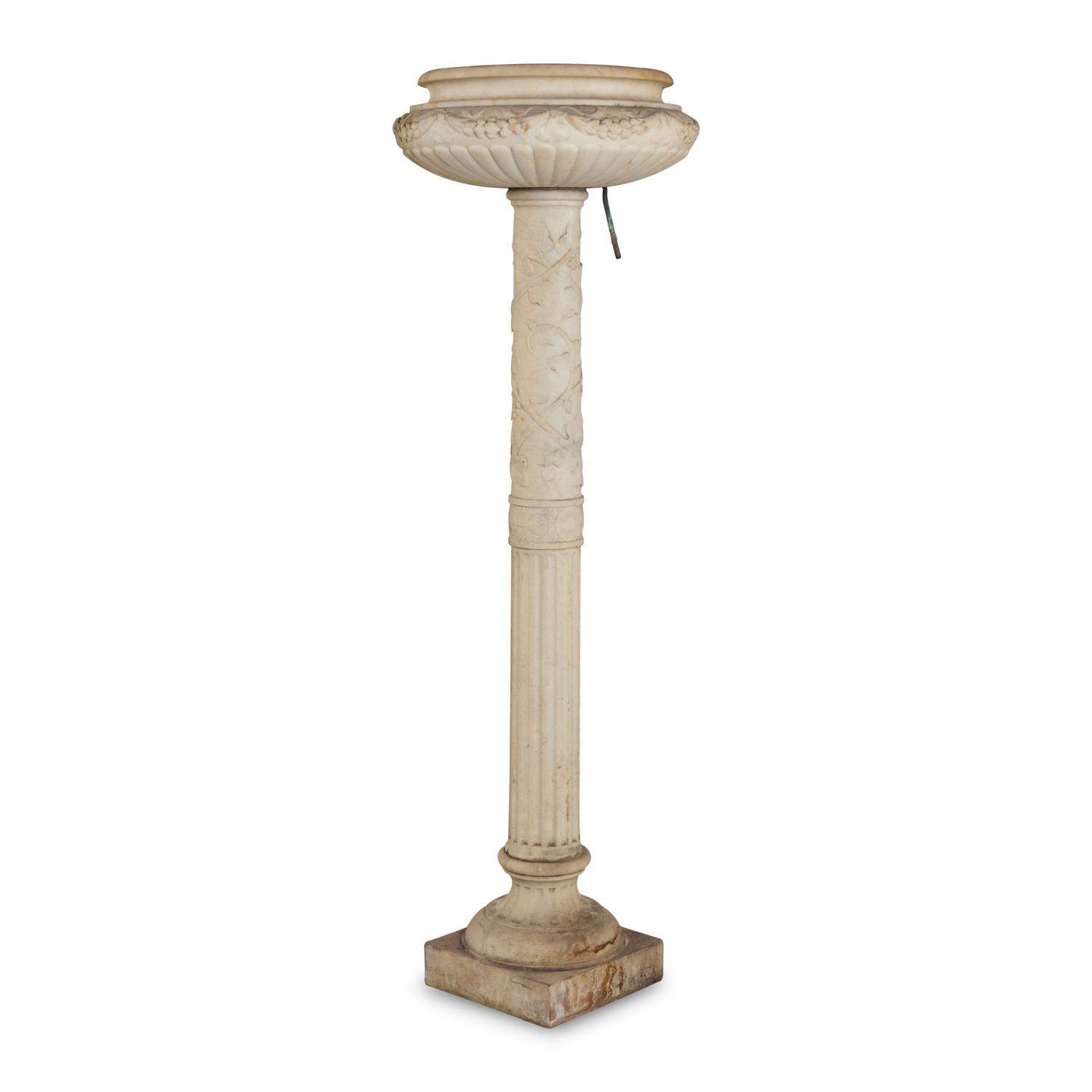 A Pair of Carved Marble Jardinières on Pedestals
