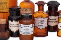 A Collection of Amber Glass Apothecary Jars