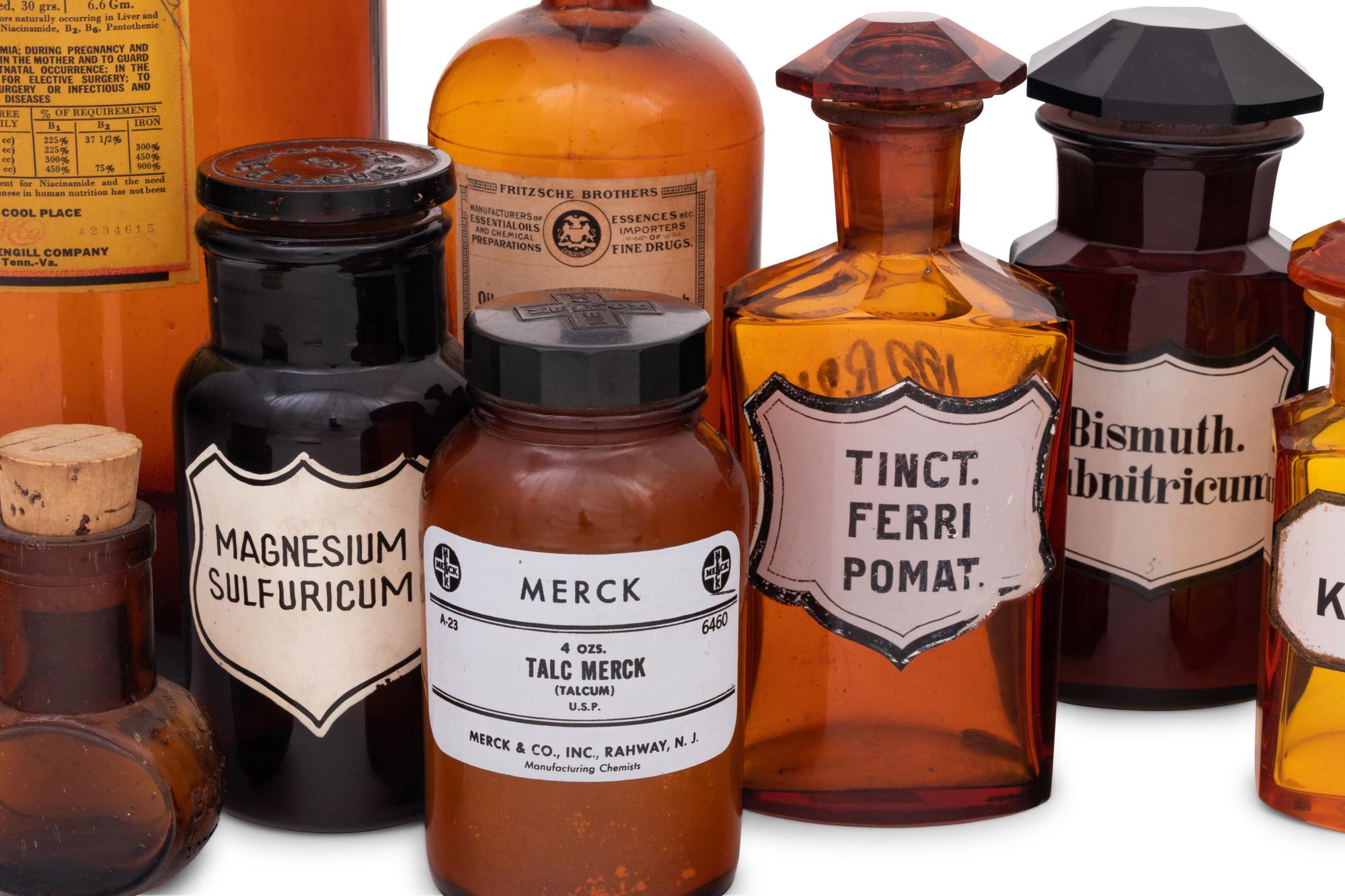 A Collection of Amber Glass Apothecary Jars