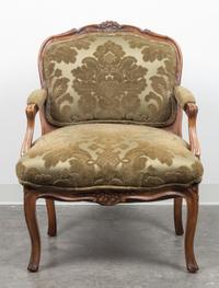 A Louis XV Style Walnut Fauteuil Height 34 x width 22 x depth 20 1/2 inches. — 20TH CENTURY