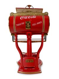 A Red Dayton Computing Scale with Coca-Cola Advertisement