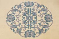 An Indian Blue and Ivory Chinese Style Wool Rug