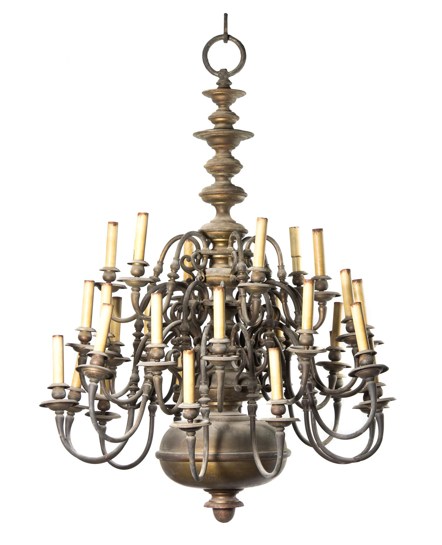 A Dutch Baroque Style Brass Thirty-Light Chandelier, Approximate height 63 x diameter 46 inches.