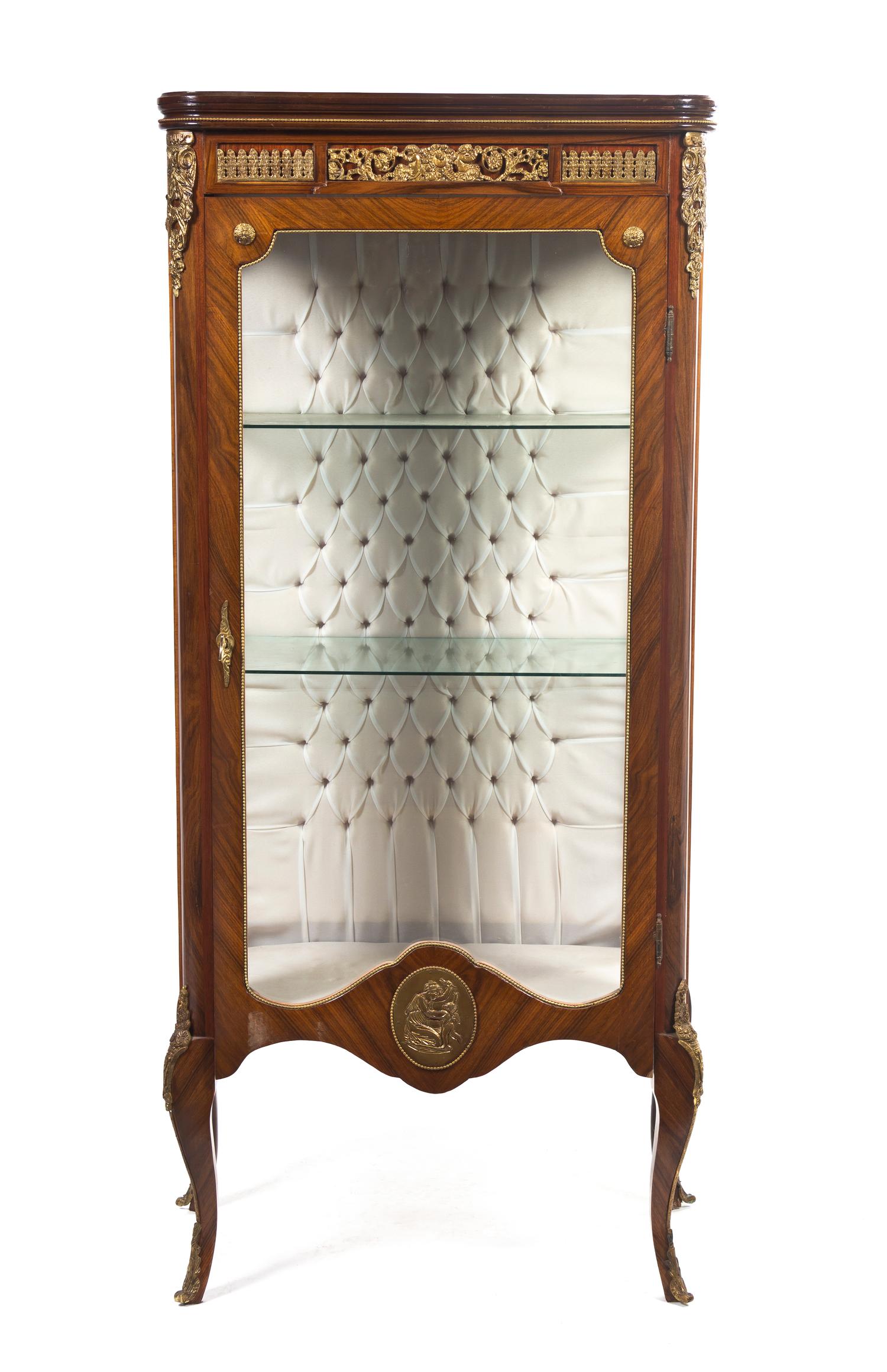 A Louis XVI Style Gilt Metal Mounted Vitrine, Height 83 x width 26 1/4 x depth 15 1/2 inches.