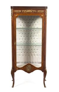 A Louis XVI Style Gilt Metal Mounted Vitrine, Height 83 x width 26 1/4 x depth 15 1/2 inches.