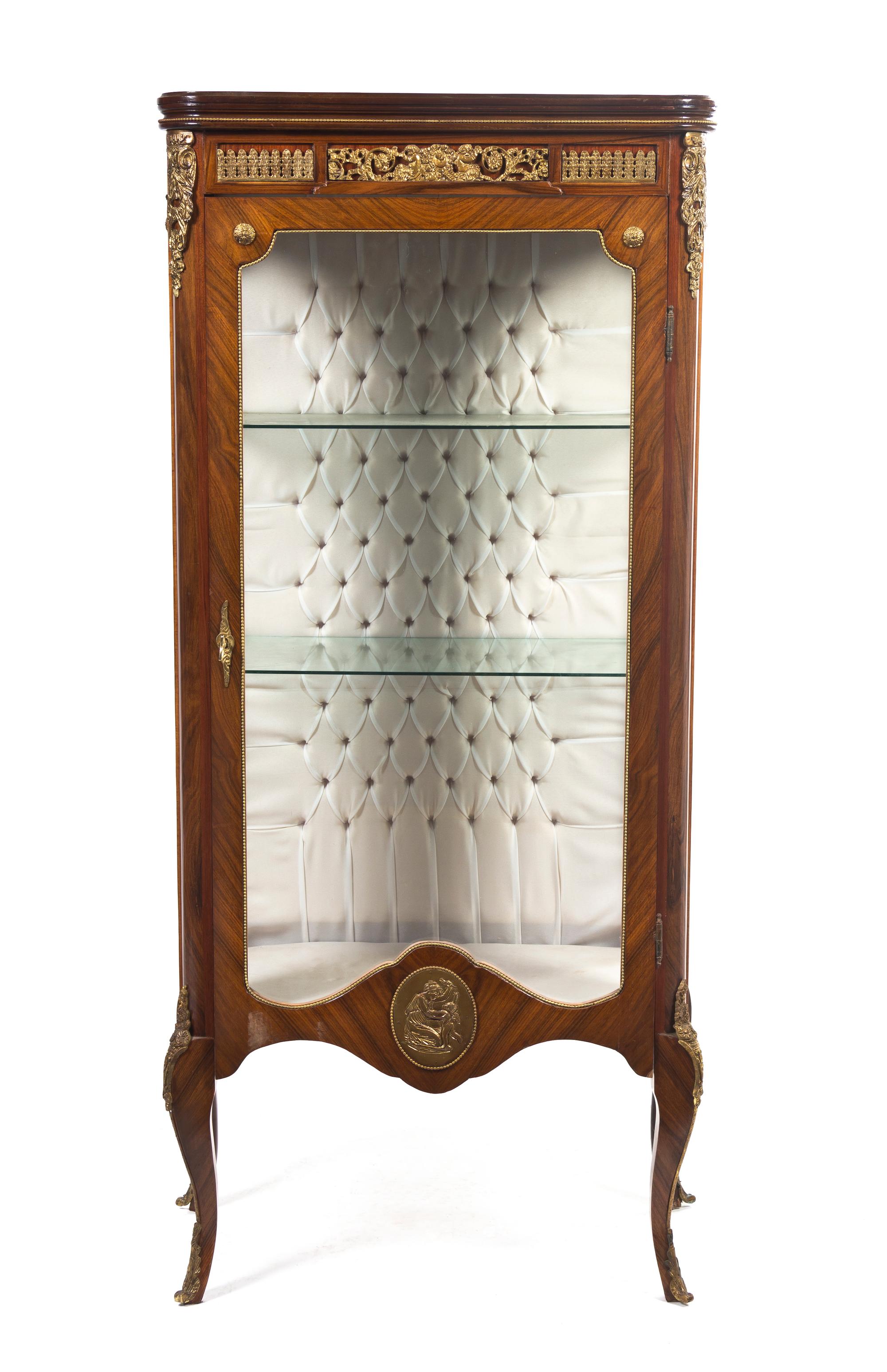 A Louis XVI Style Gilt Metal Mounted Vitrine, Height 83 x width 26 1/4 x depth 15 1/2 inches.