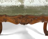 A Pair of Italian Rococo Carved Walnut Armchairs