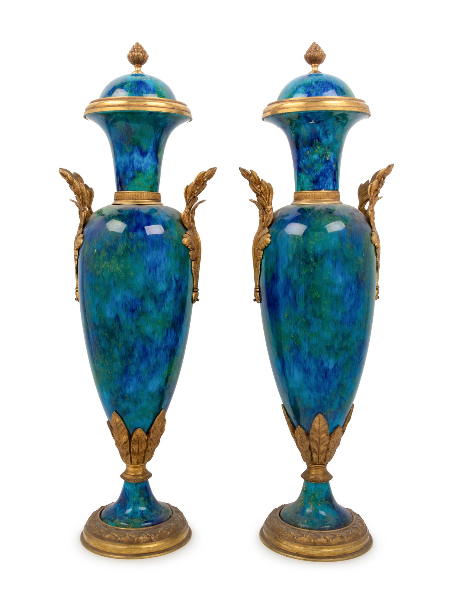A Pair of Sèvres Style Gilt Bronze Mounted Flambe Glazed Urns