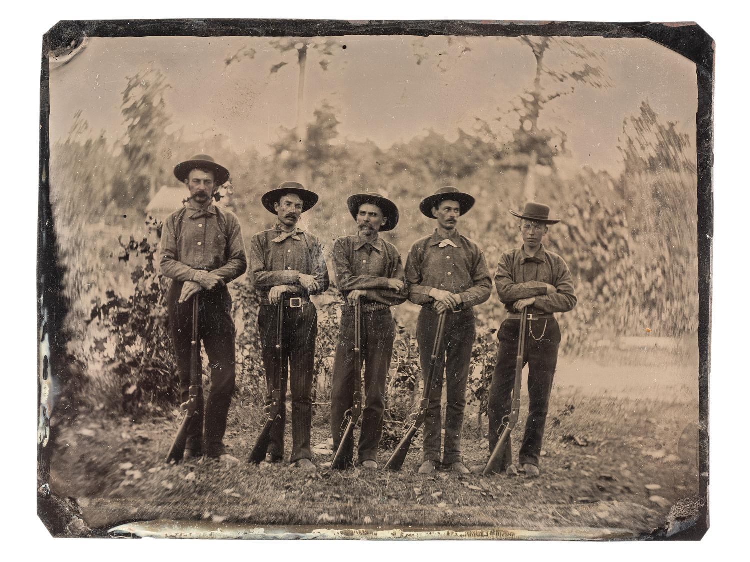 [WESTERN AMERICANA]. Quarter plate period-copy tintype of 5 men armed with Winchester rifles.