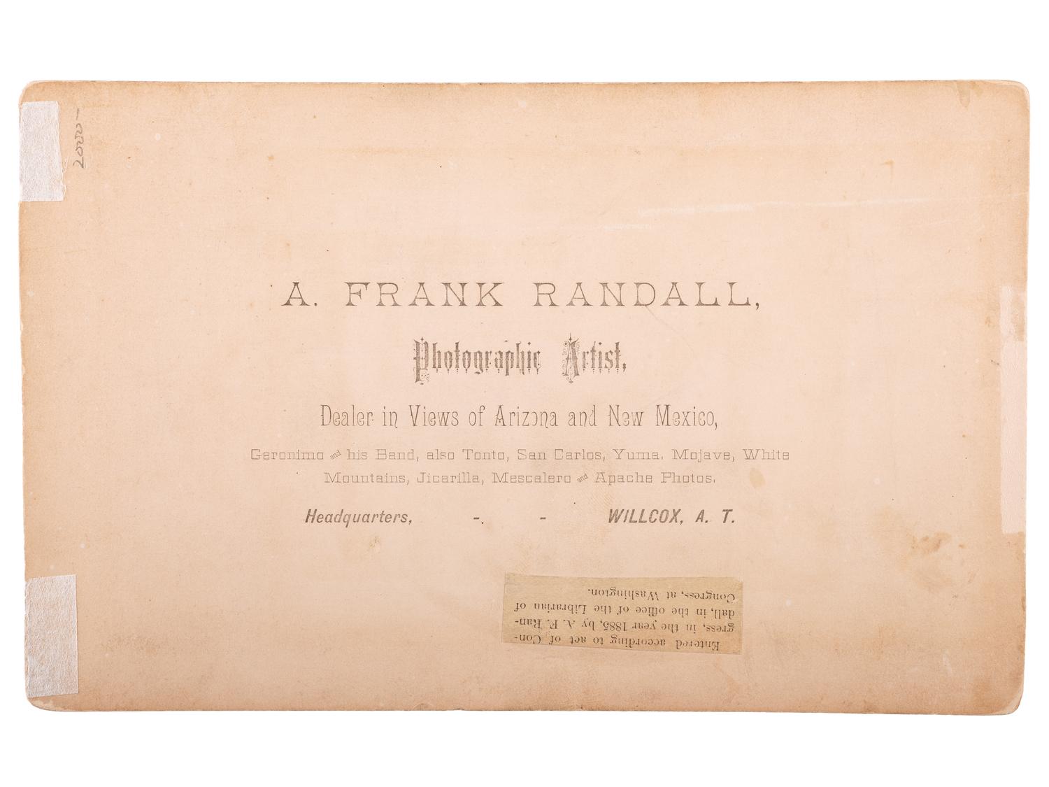 [NATIVE AMERICANS]. RANDALL, A. Frank, photographer. Boudoir card of Geronimo kneeling, holding an 1873 Springfield carbine rifle. Wilcox, Arizona Territory: 1885.
