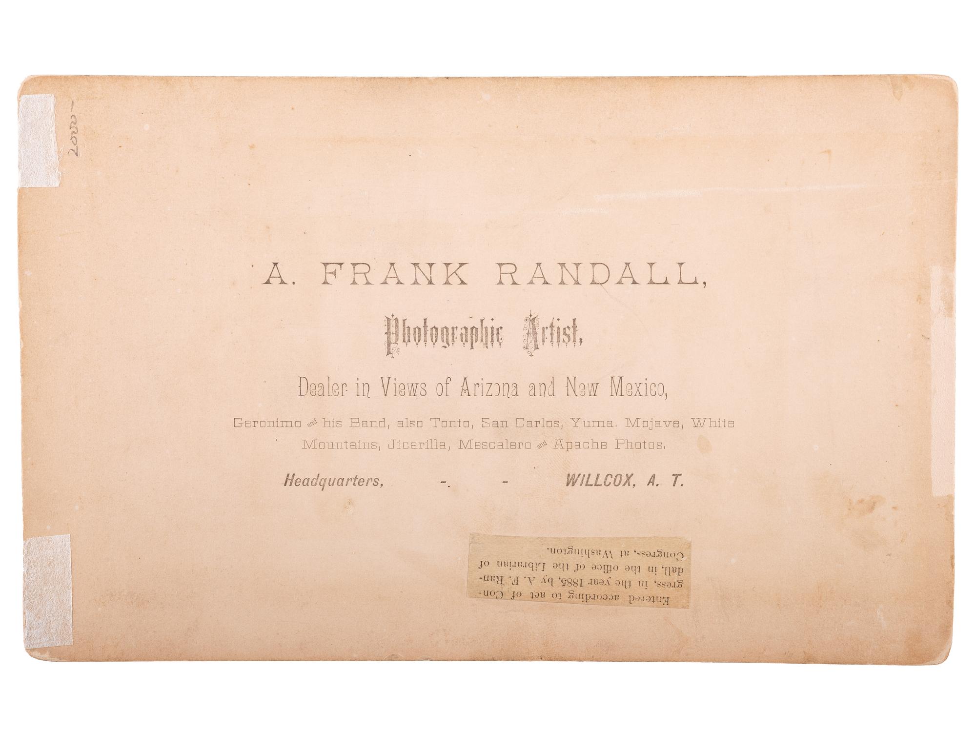 [NATIVE AMERICANS]. RANDALL, A. Frank, photographer. Boudoir card of Geronimo kneeling, holding an 1873 Springfield carbine rifle. Wilcox, Arizona Territory: 1885.