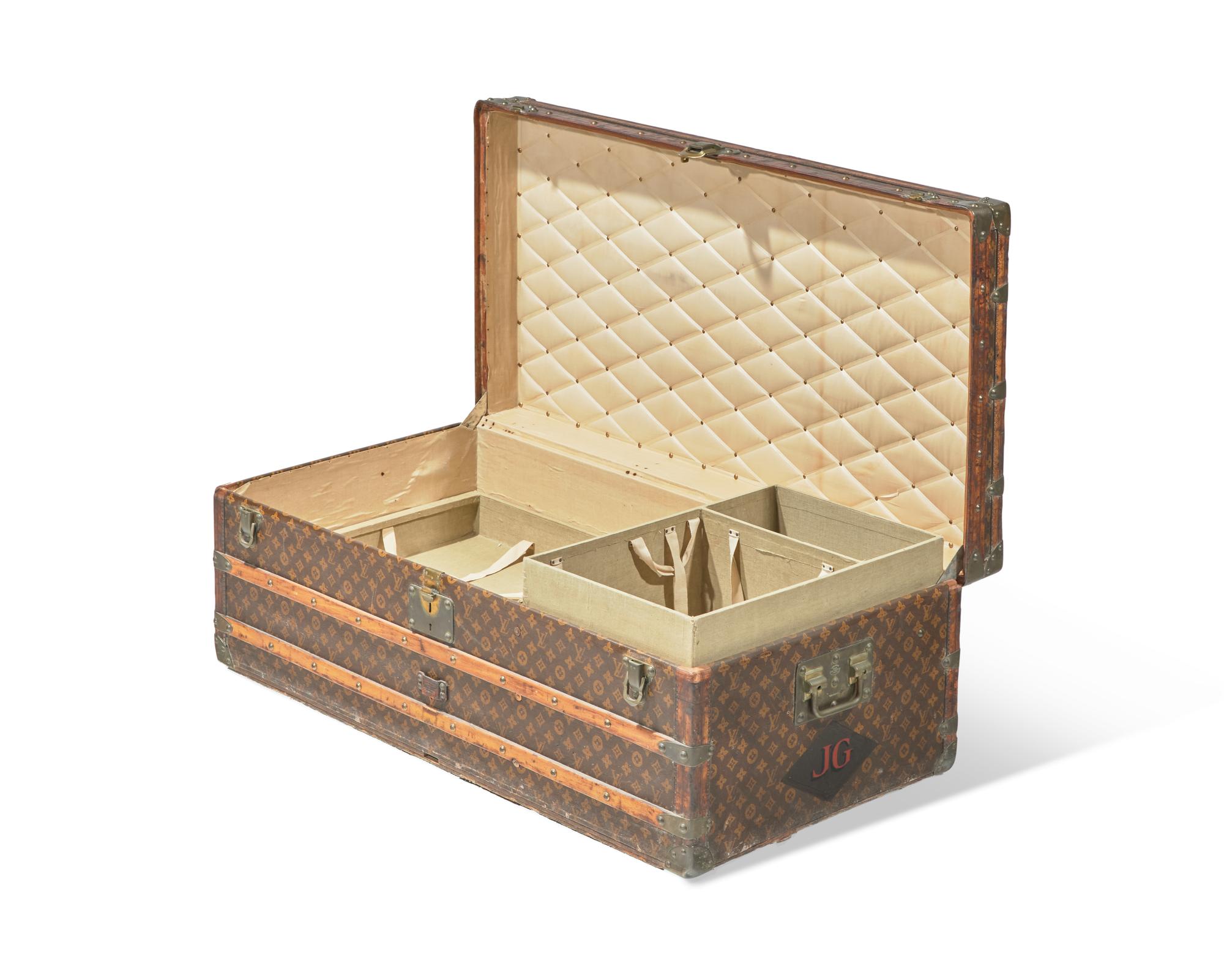 A Louis Vuitton Monogrammed Canvas Hardsided Trunk with 'JG' Monogram