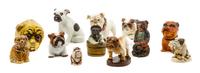 A Group of Twelve Bulldog Figures Width of widest 7 inches.