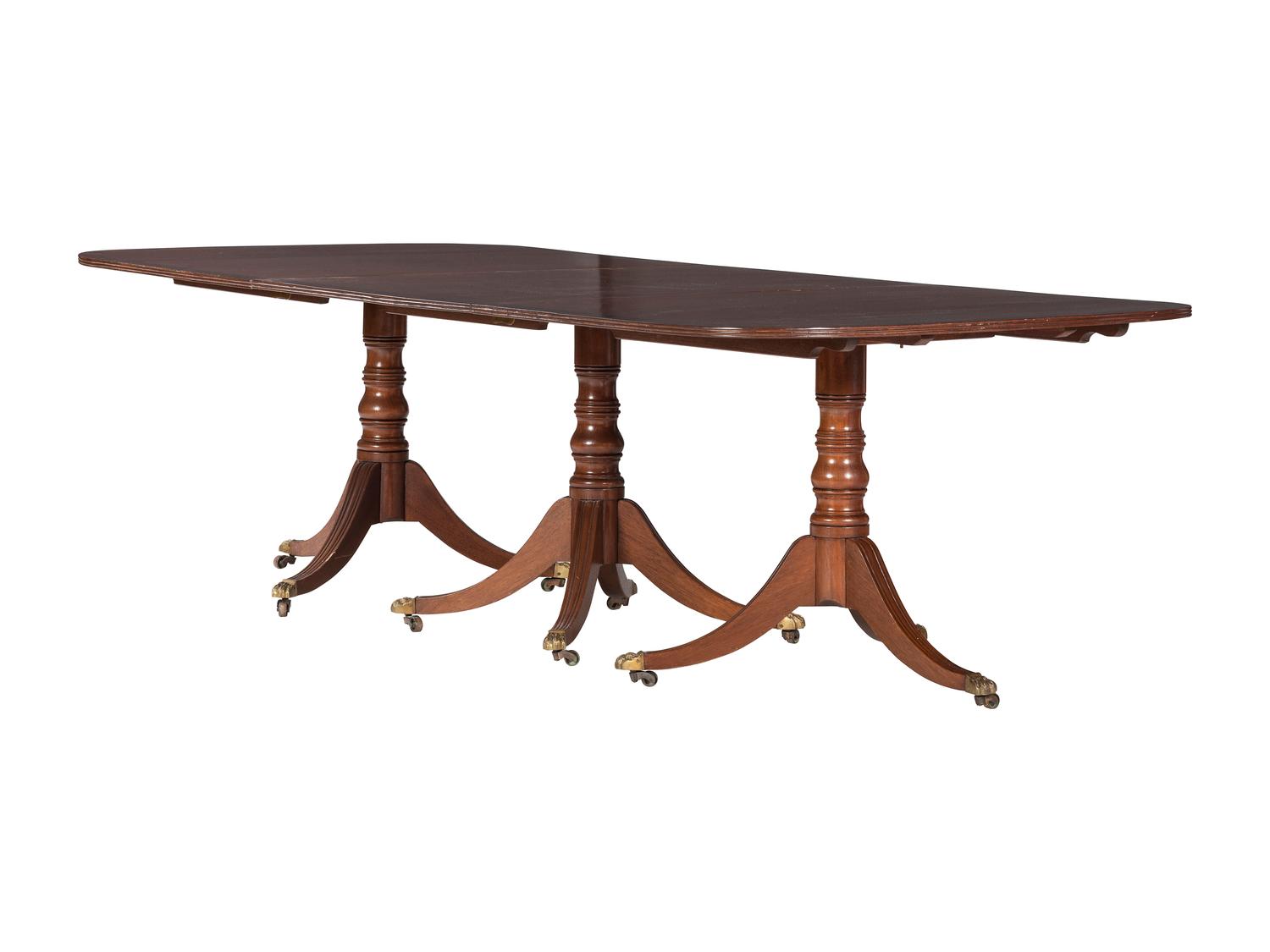 An Irish Regency Mahogany Triple Pedestal Dining Table