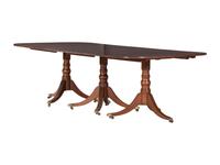An Irish Regency Mahogany Triple Pedestal Dining Table