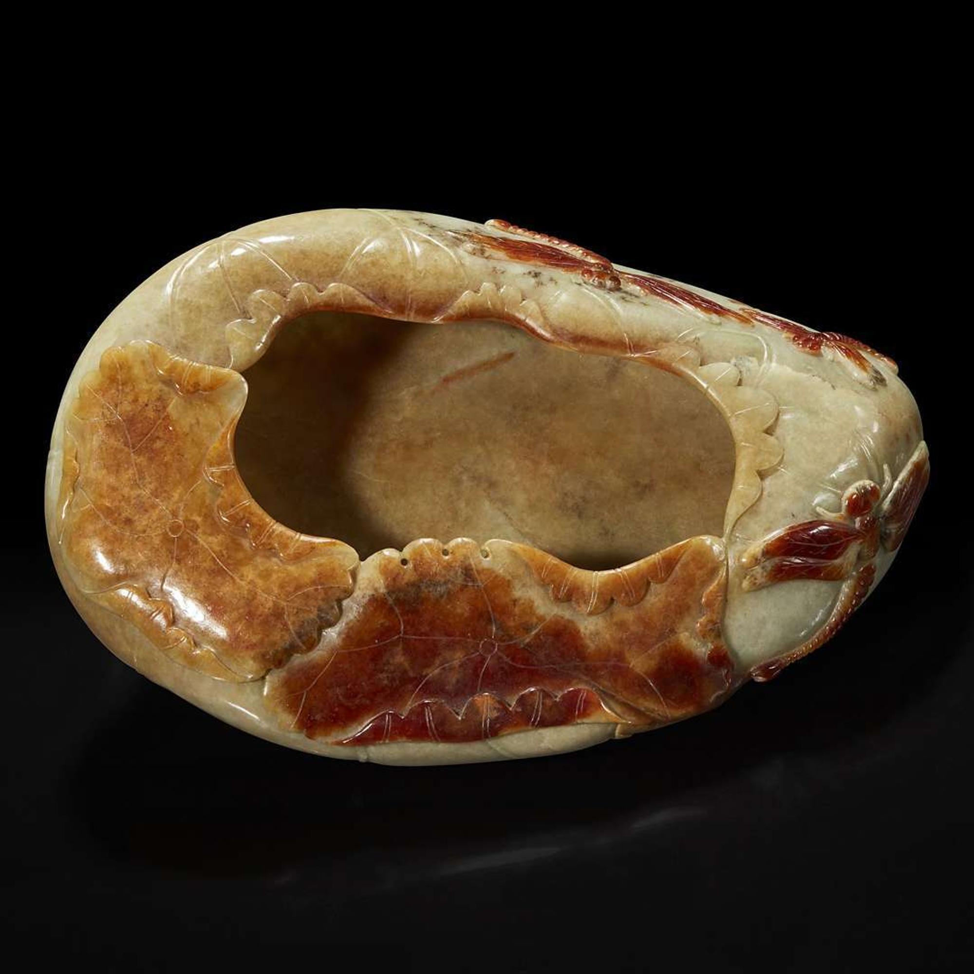 A Chinese carved russet and beige jade "Lotus Leaf" brush washer 赤褐色沁灰玉莲叶水洗