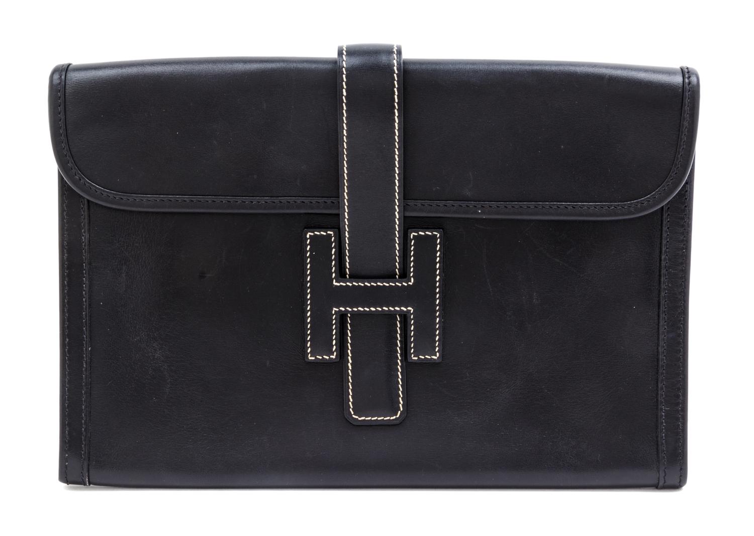 An Hermes Black Jige Elan 29 Swift Clutch, 11.5" x 6"x 1.5".