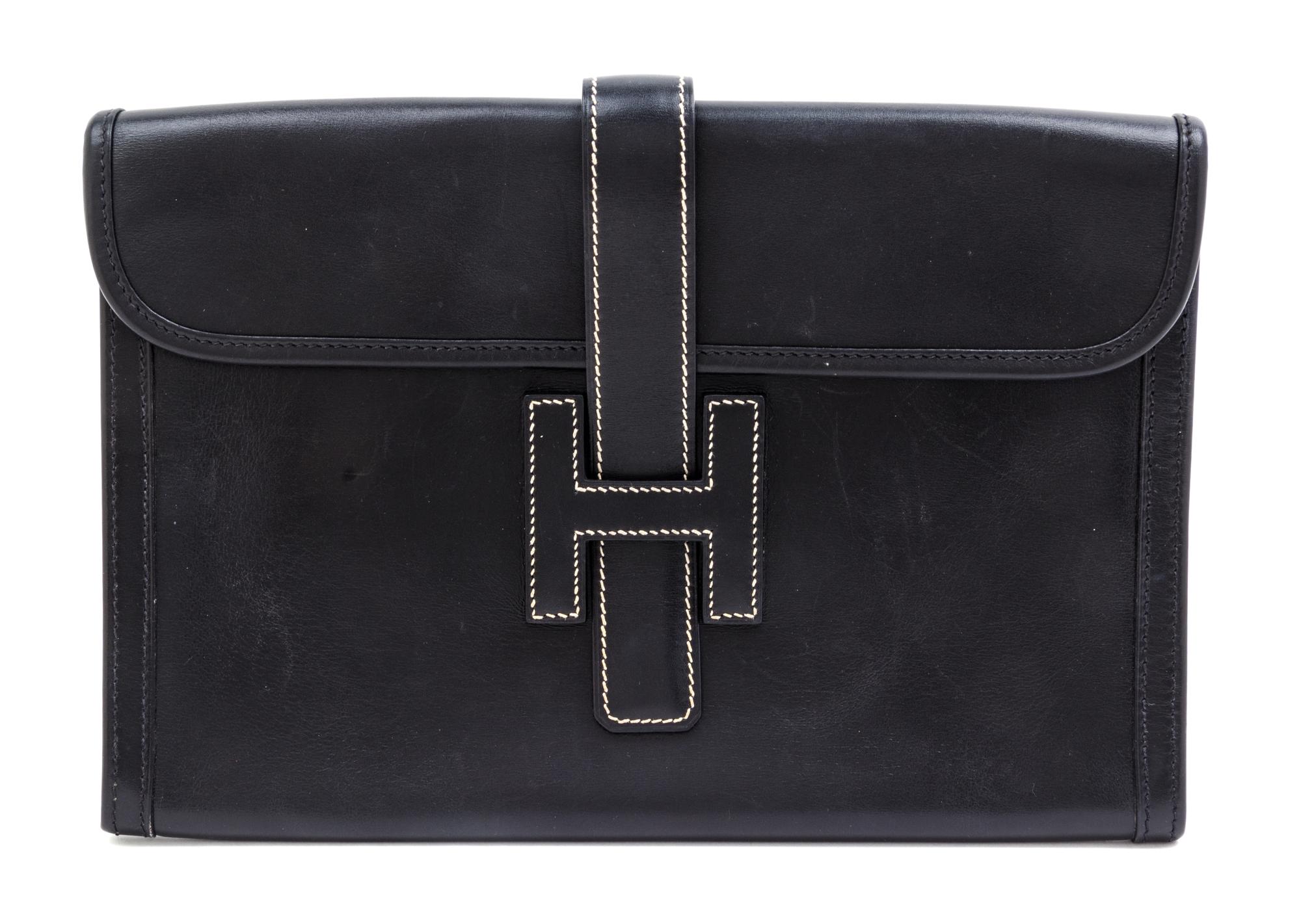 An Hermes Black Jige Elan 29 Swift Clutch, 11.5" x 6"x 1.5".