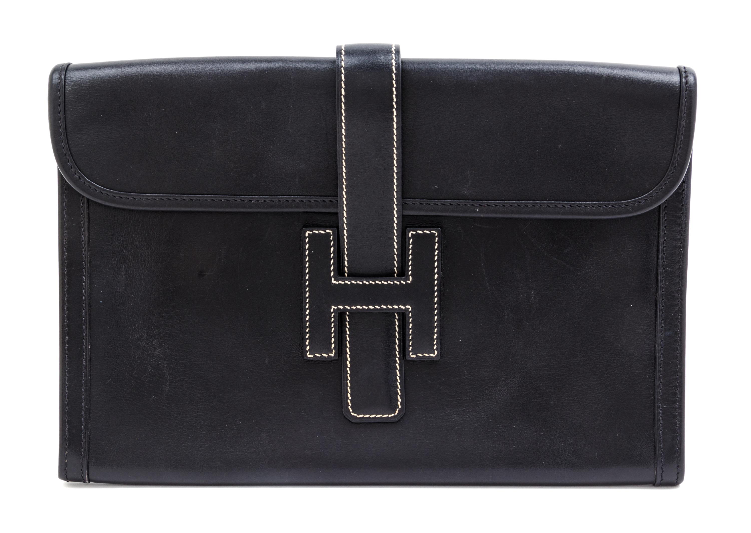 An Hermes Black Jige Elan 29 Swift Clutch, 11.5" x 6"x 1.5".