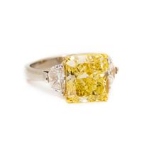 FANCY INTENSE YELLOW DIAMOND AND DIAMOND RING